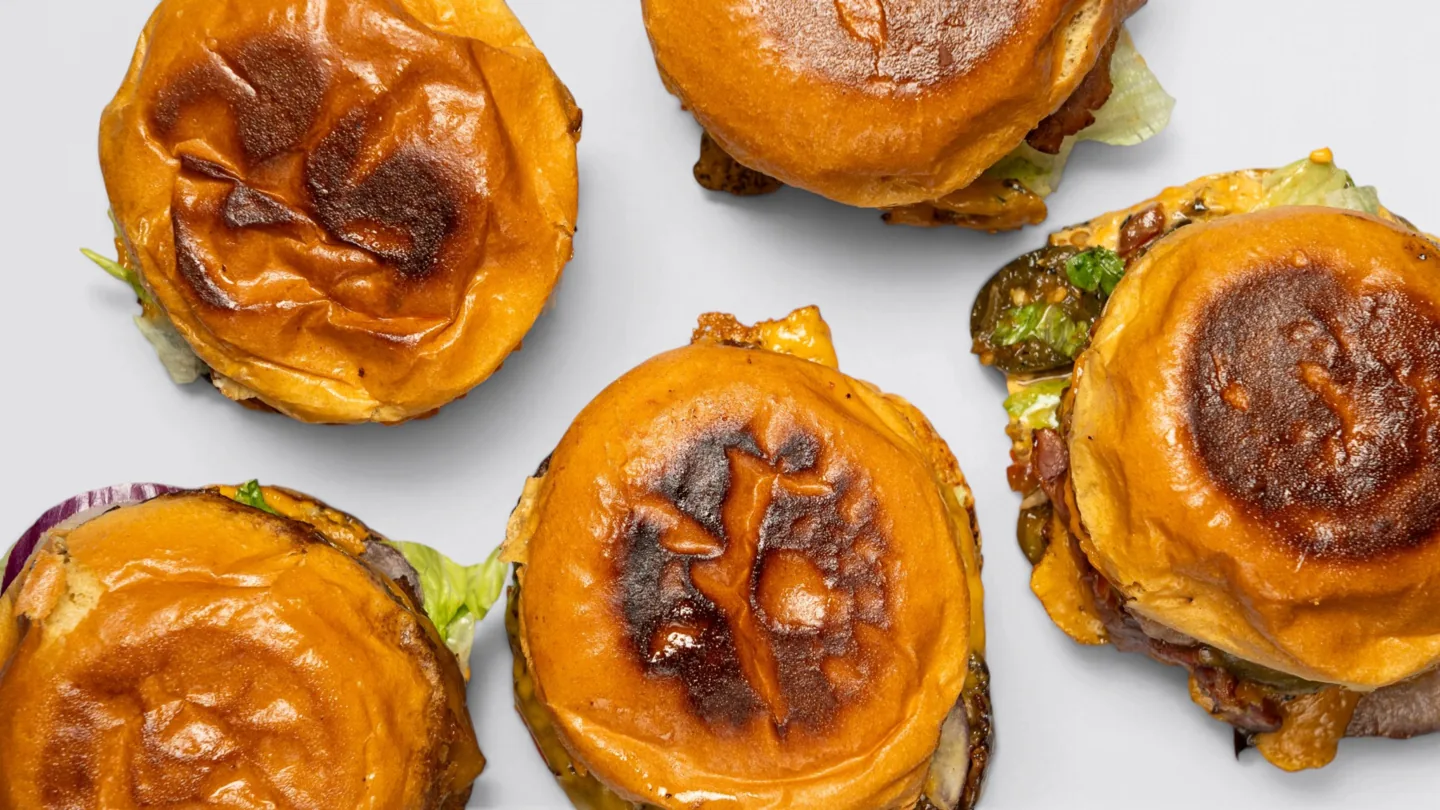 Gingerhead burgers photographed from above on a light background